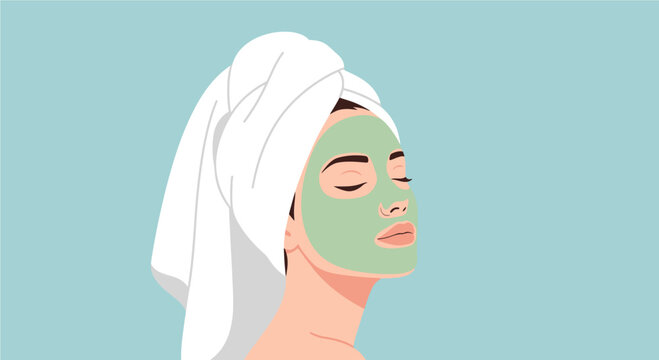 Relaxing woman with a green facial mask and towel on her head enjoying a moment of self-care and beauty treatment