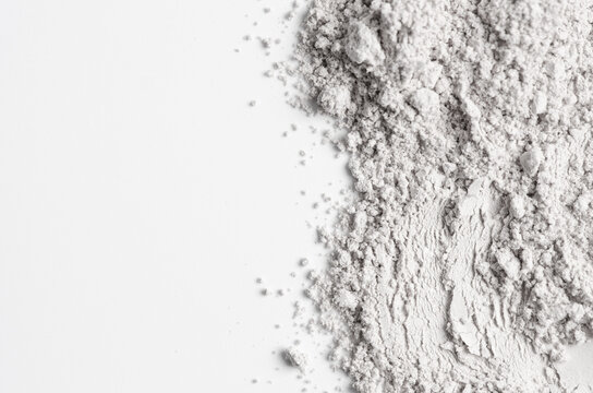 The texture of white cosmetic clay. The concept of cosmetic procedures or mud treatment. Copy space