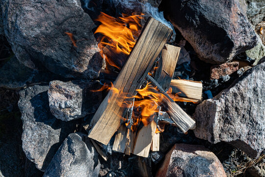 Open fire inside ring of stones for safety