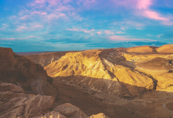 Fototapeta premium Mountain nature landscape. View of the valley from the mount. Desert in the early morning. The Judaean Desert. Landscape in Dead sea region. Nature Israel