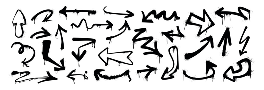 Hand drawn brush stroke arrows different shapes. Black bold curly, wavy or squiggly arrow vector set. Spray paint graffiti direction graphic design elements with drips, splatters in retro grunge style