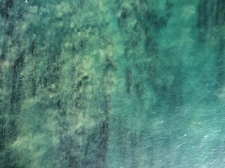 Fototapeta premium An abstract representation of ocean depths showcases mesmerizing patterns and colors, inviting observers to reflect on the serene beauty and mysterious nature of the sea.