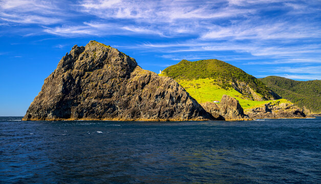 Hole in the rock island formation in new zealand