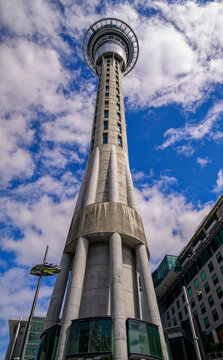 Sky tower auckland landmark against blue sky
