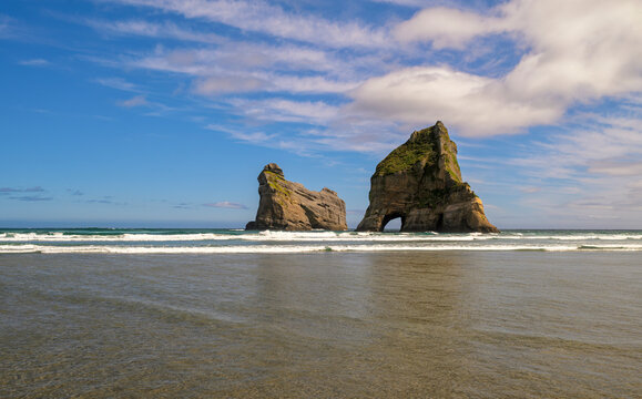 Wharariki beach archway islands coastline, new zealand