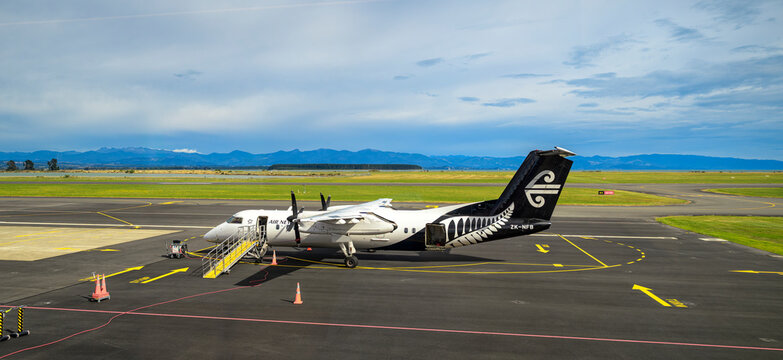 Air new zealand DHC-8 DASH-8 300 plane parked at airport gate on Nelson Airport