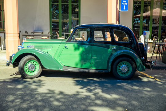 Wolseley Series II 14-56 car parked at art deco festival in Napier