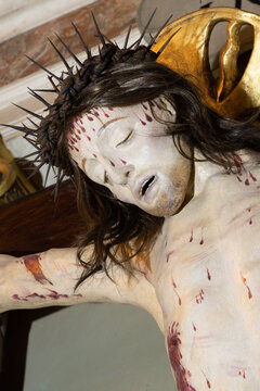 MONZA, ITALY - MARCH 19, 2026:  The detail of carved polychrome Crucifixion in the church Chiesa di Santa Maria al Carrobiolo by Battista da Saronno from 16. cent. 