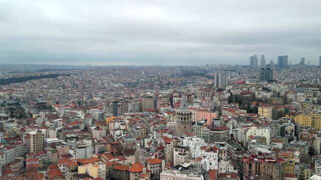 the Galata Tower, business part of the city in the background rotate left shot