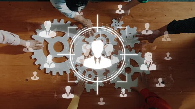 Collaborative Teamwork with Gears and Silhouettes Representing People in a Modern Business Environment Sigmoid