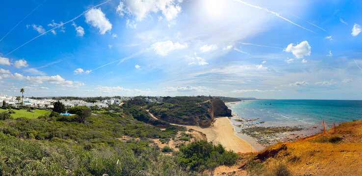 View from the cliffs of the bay Cala del Puntalejo with the B&uacute;nker de fuente del gallo and the beach Fuente del Gallo near Conil de la Frontera, Cadiz, Costa de la Luz, Andalusia, Spain