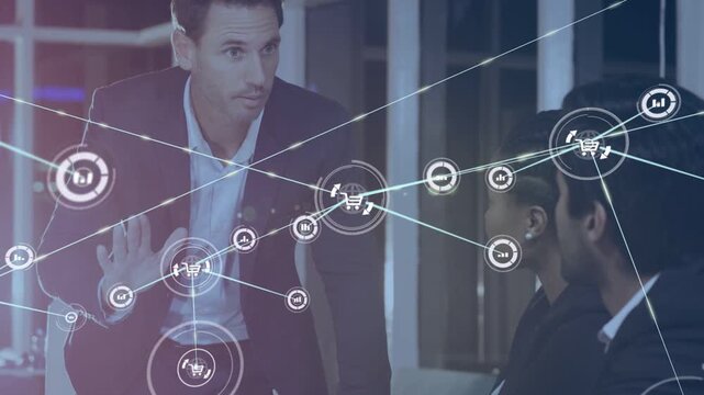 Standing exec leaning speaking, expanding HUD cart network showing sales data, peer writing notes