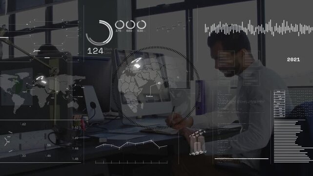 Vertical video: Man analyst writing, thinking deskside as business overlays animating globe charts