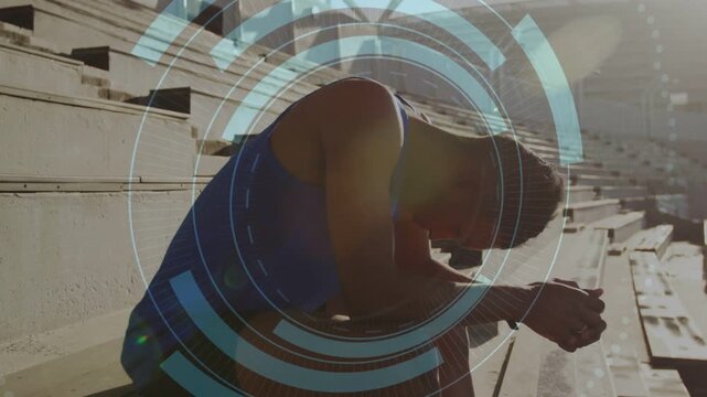 Male athlete sitting on bleachers responding to HUD torso overlay, sitting up for fitness