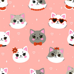 Naklejka premium Seamless pattern with cute cat faces on a pink background. Vector graphics.