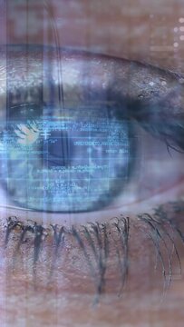 Vertical video: Female eye opening, eyelid lifting revealing HUD code for iris scanning, closing