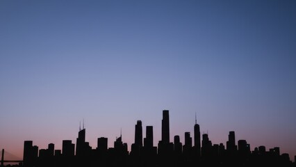 Obraz premium a city skyline at dusk, featuring tall buildings silhouetted against a gradient sky transitioning from deep blue to soft pink