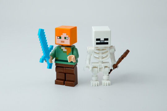 Minecraft toy characters arranged closely together, featuring a figure with a blue sword beside a white skeleton figure on a plain light background on Apr 13, 2026 in Jakarta, Indonesia