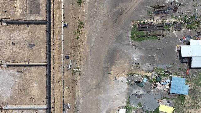 Abandoned Construction Site with Unfinished Structure and Urban Decay