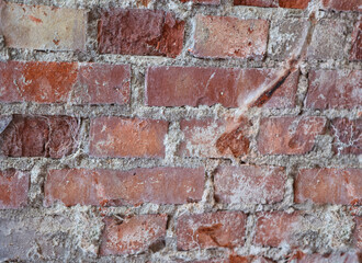 Naklejka premium Eine Steinwand Textur mit Klinker.