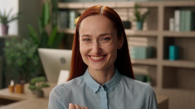 Smiling Caucasian business woman inviting with hand come here in office happy female businesswoman welcoming gesture looking at camera friendly manager recruitment HR designer worker join team indoors