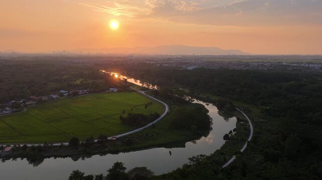 Aerial drone view of Labuh Banting river bend at sunset