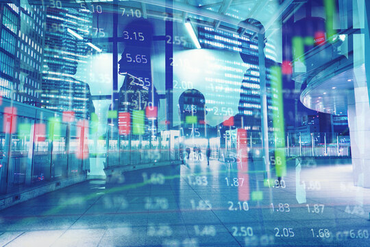 City finance scene shows people walking past large buildings with stock market data overlay on a busy city street in the evening