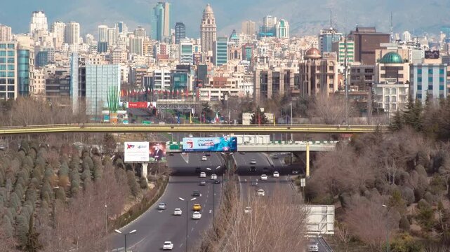 Aerial View of Tehran Cityscape and Urban Highway Infrastructure. breathtaking architecture and modern skyline. Iran Israel conflict and infrastructure capacity.  