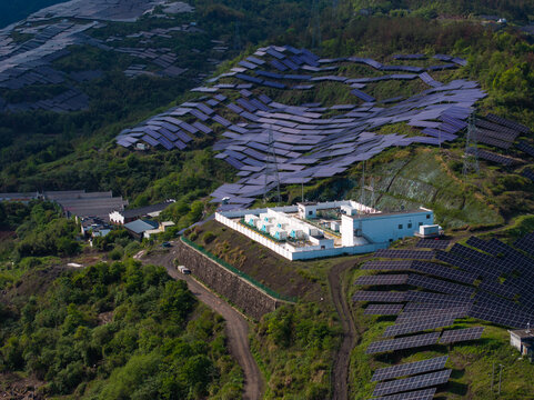 Hillside terraced photovoltaic power station with substation facilities and solar panels