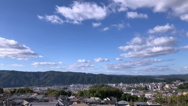 Reverse 4K Timelapse of Clouds Over Mountain Town (No Audio