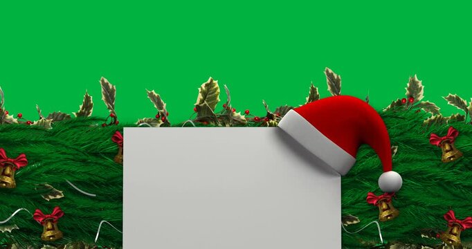 Santa hat over square banner with copy space over decorated green tree branch on black background