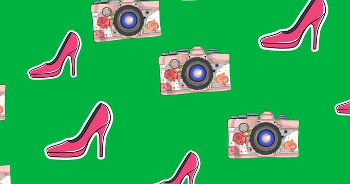 Digital animation of multiple female shoes and digital camera icons floating on black background
