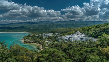 Naklejka premium Luxurious resort nestled amidst lush green hills and a turquoise bay