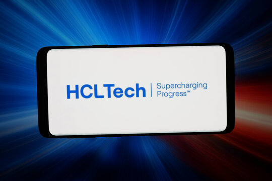 Stuttgart, Germany - 04-09-2026: In this photo illustration, the logo of company HCL Technologies Limited (HCLTech) is displayed on a smartphone in front of abstract background on computer screen.