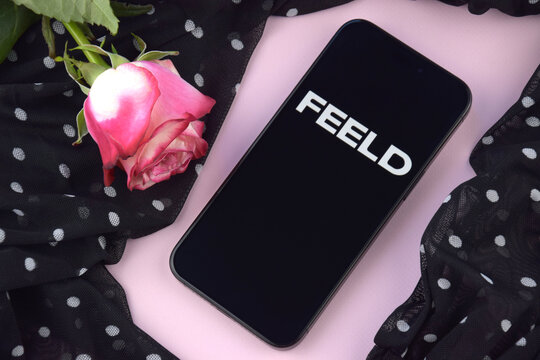 Feeld dating app on smartphone screen.