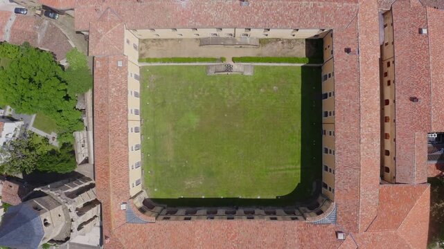 Aerial View of Symmetrical Courtyard Surrounded by Historic Buildings