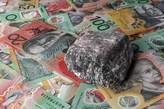 Zinc mine, mining Australia. Sphalerite sulfide ore isolated on Australian Dollar currency, money, notes. Investment, financial stock market, Australian Securities Exchange