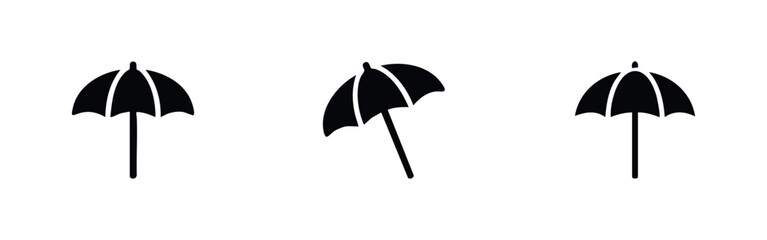 Fototapeta premium Three umbrellas, one open and two angled, black silhouettes on white background