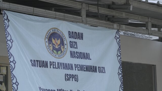 A banner of Badan Gizi Nasional or National Nutrition Agency for the Free Nutritious Meal program from the Indonesia government for school students. Jakarta, March 22, 2026