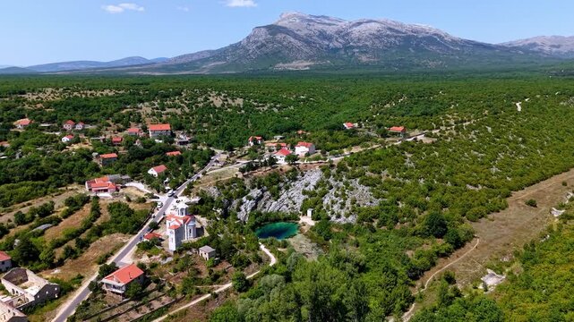 Aerial panoramic view of the Eye of the Earth, the source of the Cetina River in Croatia