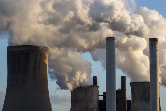 RWE Power AG, Niederaussem power plant, lignite-fired power plant, steaming chimneys, coal exit, Bergheim, Rhenish lignite mining area, North Rhine-Westphalia, Germany
