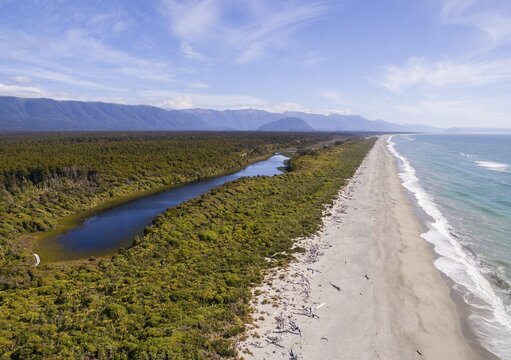 Aerial View, Beach and Coast View, moderate rainforest and lake, Southern Alps, Ship Creek, Haast, West Coast, New Zealand