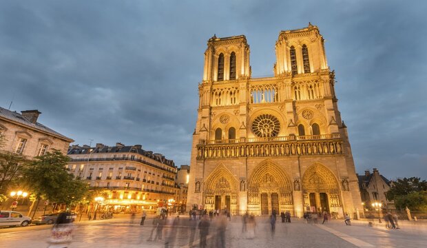 Notre Dame Cathedral at dusk, interior, western facade, Ile de la Cite, Paris, Region Ile-de-France, France