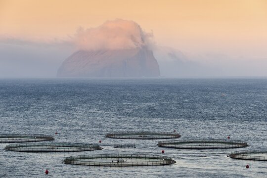 Fish farm, clouds and sea, Koltur, &Uacute;toyggjar, Faroe Islands, Denmark