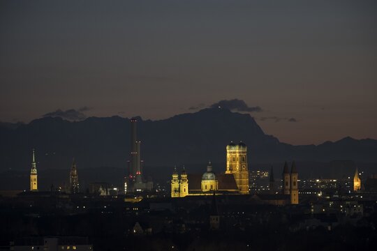 View over Munich with Church of Our Lady, Theatine Church, Ludwigskirche, in the back Zugspitze at evening mood, Munich, Upper Bavaria, Bavaria, Germany