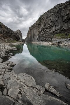 Stu&eth;lagil Canyon, turquoise river between basalt columns, Egilsstadir, Iceland