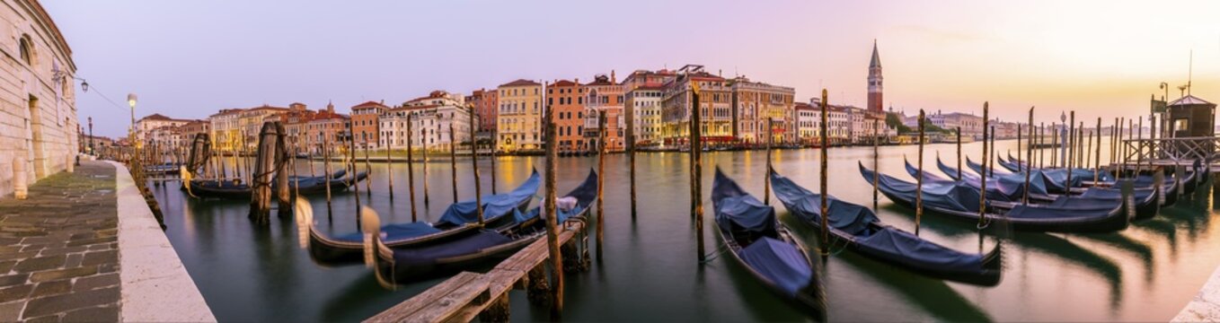 Evening atmosphere, sunset at the Grand Canal, gondolas at the pier, Campanile bell tower, Venice, Veneto region, Italy