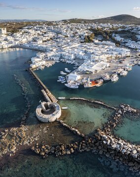 Aerial view, town view and harbour of Naoussa, harbour wall with Venetian ruins, Paros, Cyclades, Greece