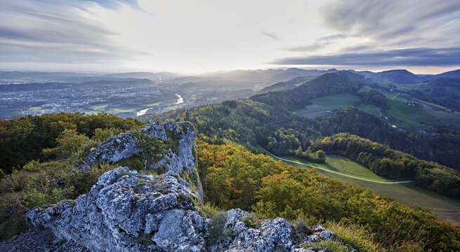 View from the Gisliflue of an autumnal forest with the Jura foothills behind, Talheim, Canton, Aargau, Switzerland