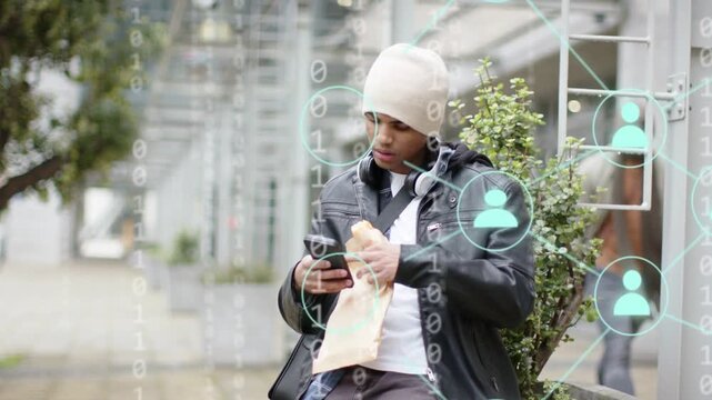 Man leaning on wall scrolling phone eating and tapping making binary icons linking phone social app